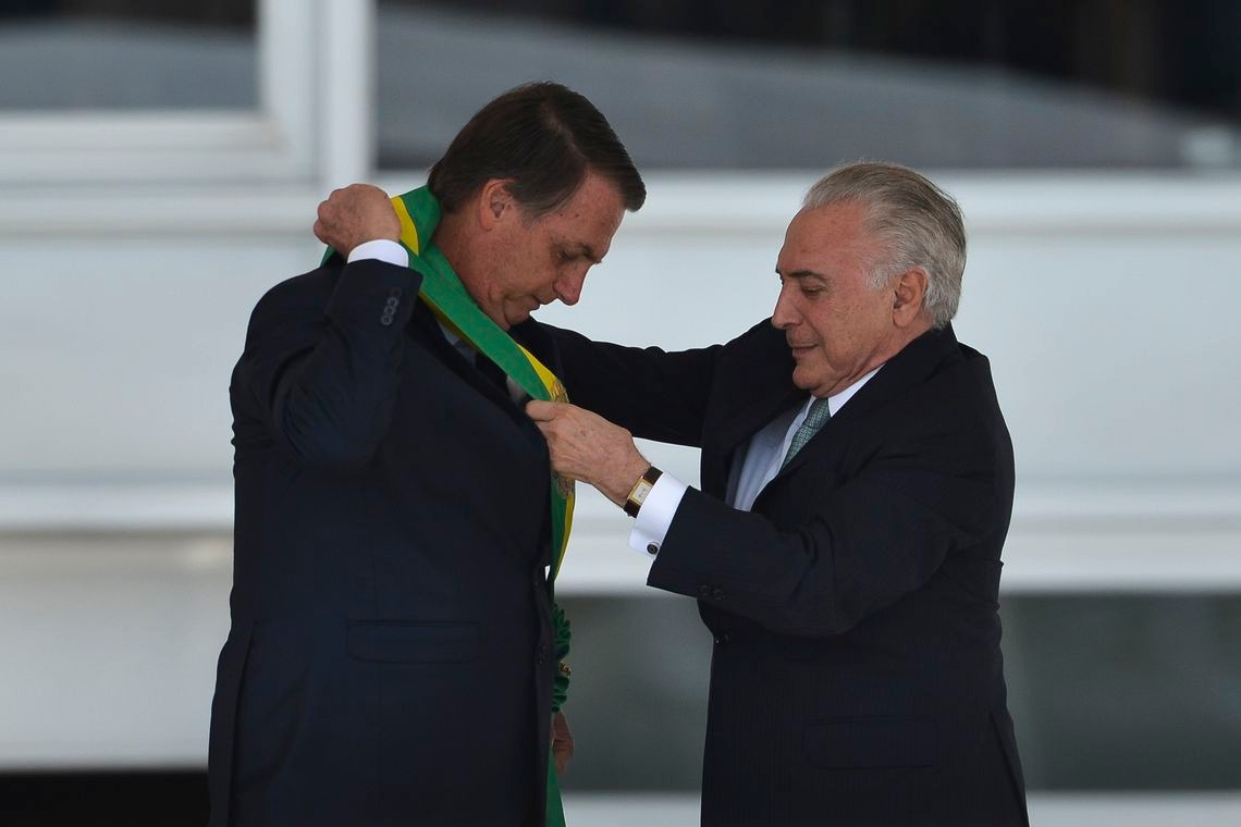Bolsonaro recebe faixa de TemerFoto: Marcelo Camargo/EBC